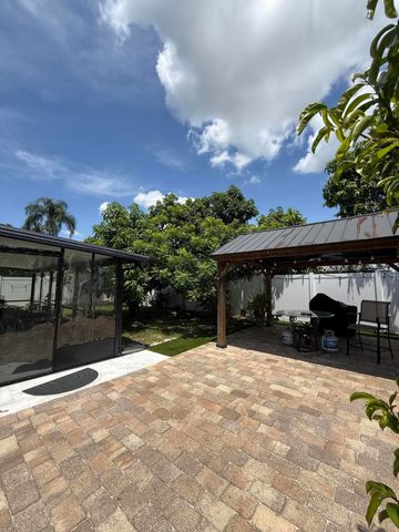 7743 Elwood Drive, Greenacres, FL 33467