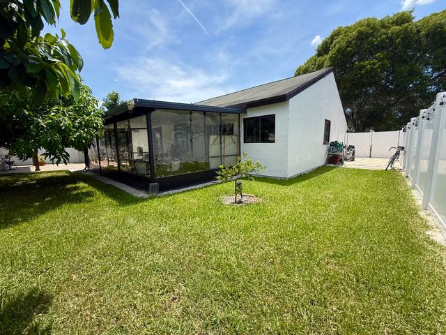 7743 Elwood Drive, Greenacres, FL 33467