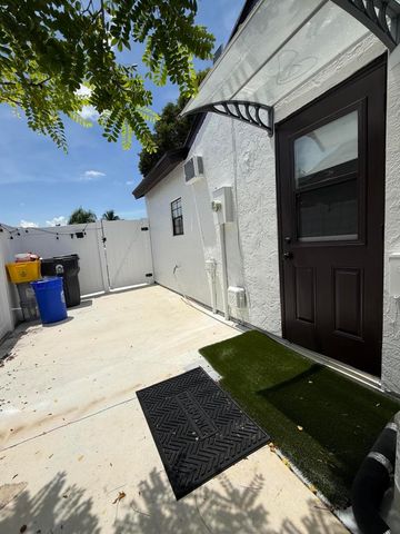 7743 Elwood Drive, Greenacres, FL 33467