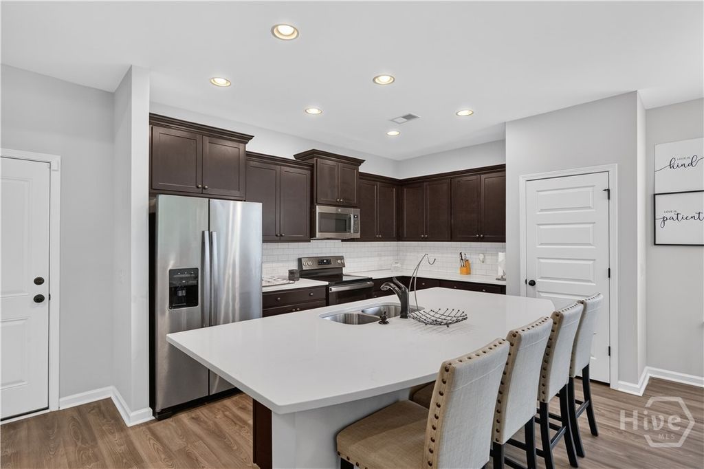 Image 16 of property listing at 4881 Castleoak Drive, Richmond Hill, GA 31324