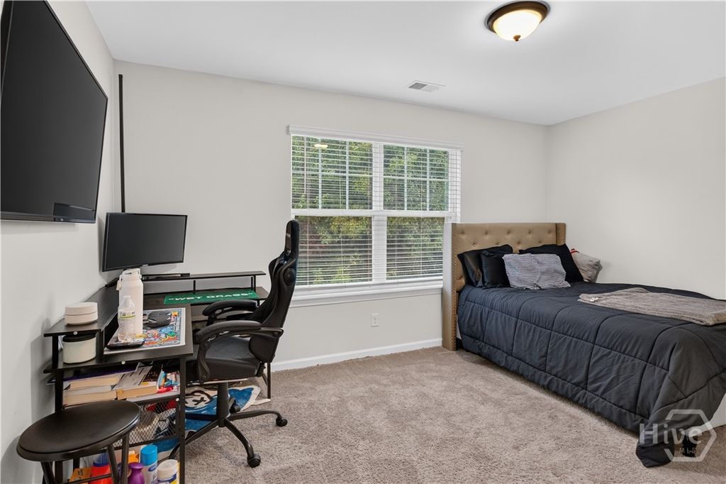 Image 25 of property listing at 4881 Castleoak Drive, Richmond Hill, GA 31324