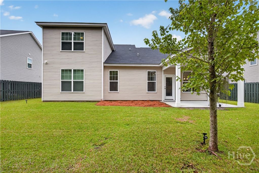 Image 38 of property listing at 4881 Castleoak Drive, Richmond Hill, GA 31324