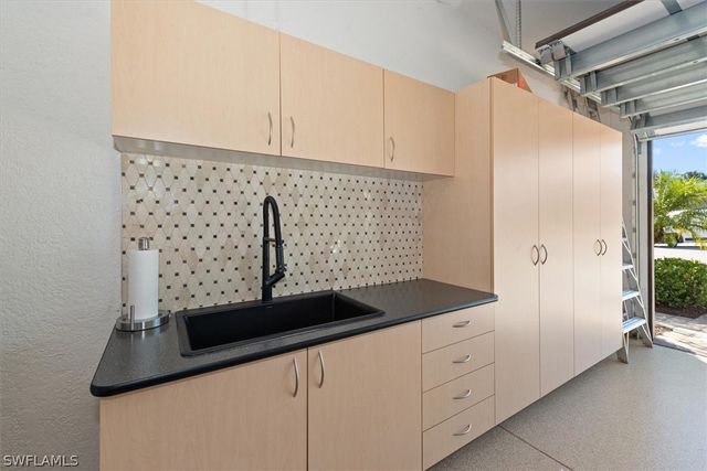 3168 Pacific DR, Naples, FL 34119