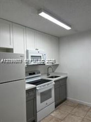 6990 NW 186th St 4-210A, Hialeah, FL 33015