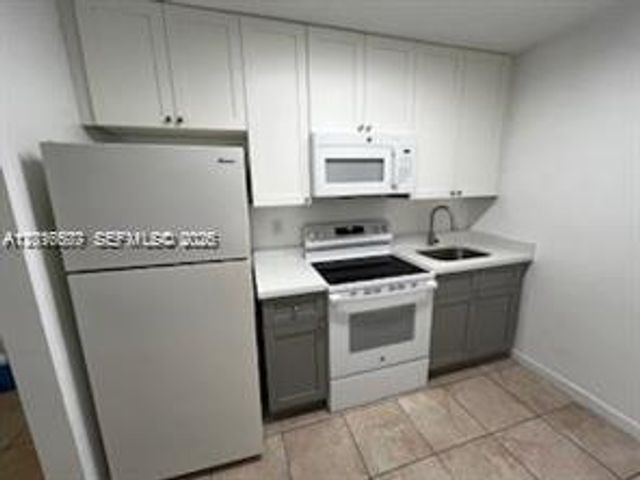 6990 NW 186th St 4-210A, Hialeah, FL 33015