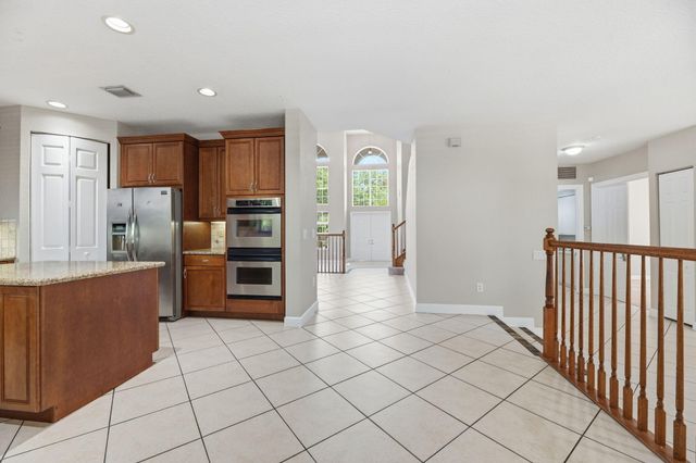 9705 Napoli Woods Lane, Delray Beach, FL 33446