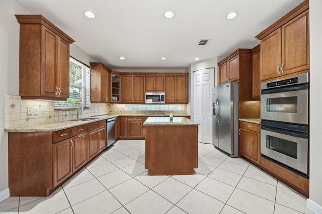 9705 Napoli Woods Lane, Delray Beach, FL 33446