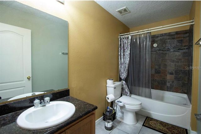 1412 BLACKWATER POND DRIVE, Orlando, FL 32828