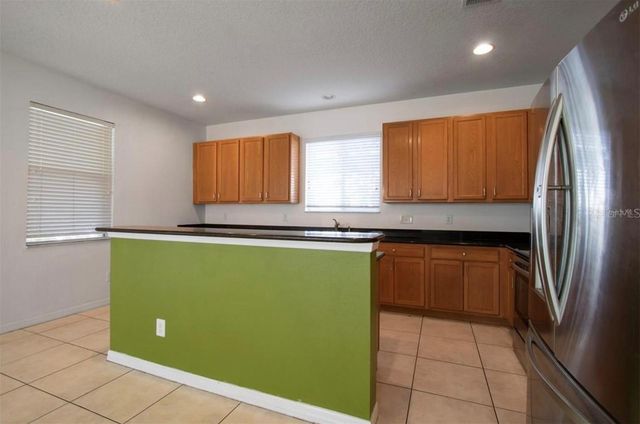 1412 BLACKWATER POND DRIVE, Orlando, FL 32828
