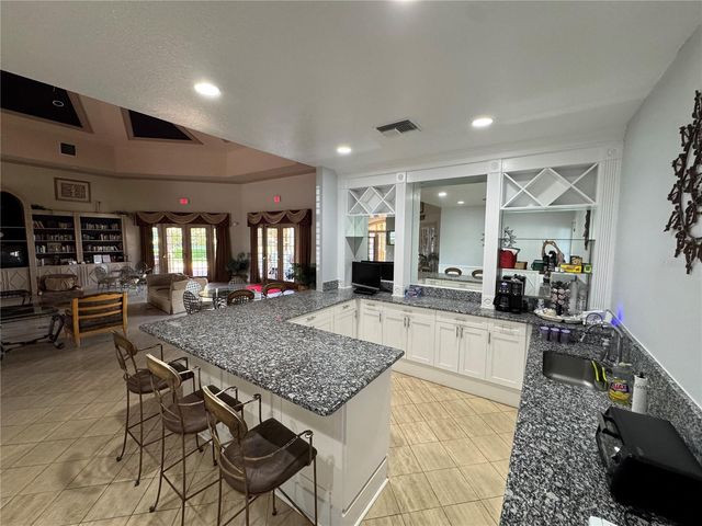 9288 LAKE CHASE ISLAND WAY, Tampa, FL 33626