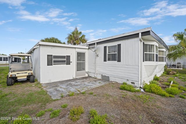 722 Lark Drive, Barefoot Bay, FL 32976