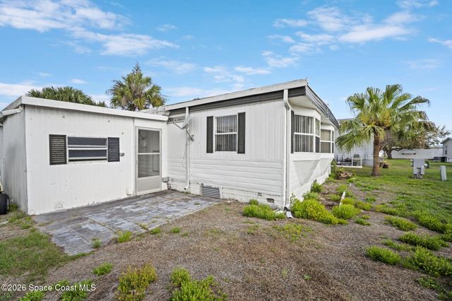 722 Lark Drive, Barefoot Bay, FL 32976