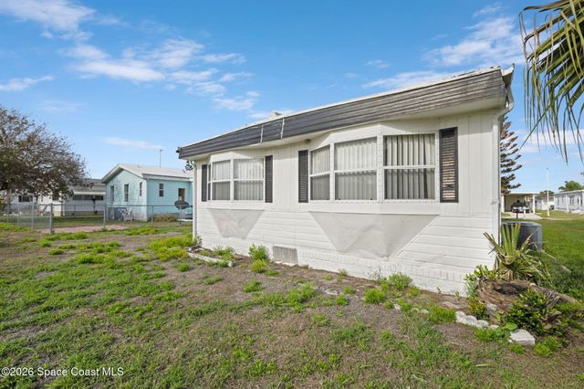 722 Lark Drive, Barefoot Bay, FL 32976