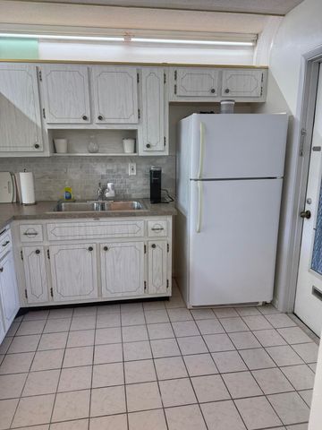 2616 N Gardens Drive 105, Lake Worth, FL 33461