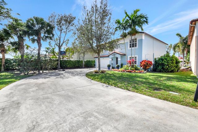 6755 Rainwood Cove Lane, Lake Worth, FL 33463