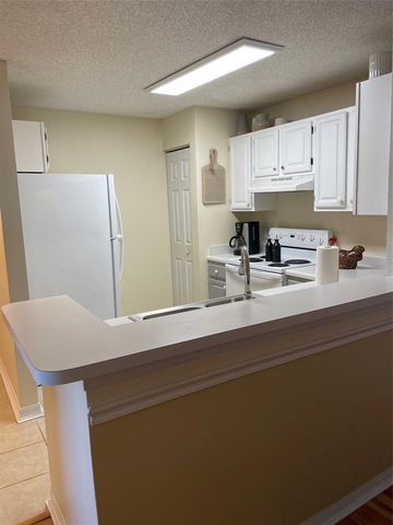 1909 SUMMER CLUB DRIVE 211, Oviedo, FL 32765