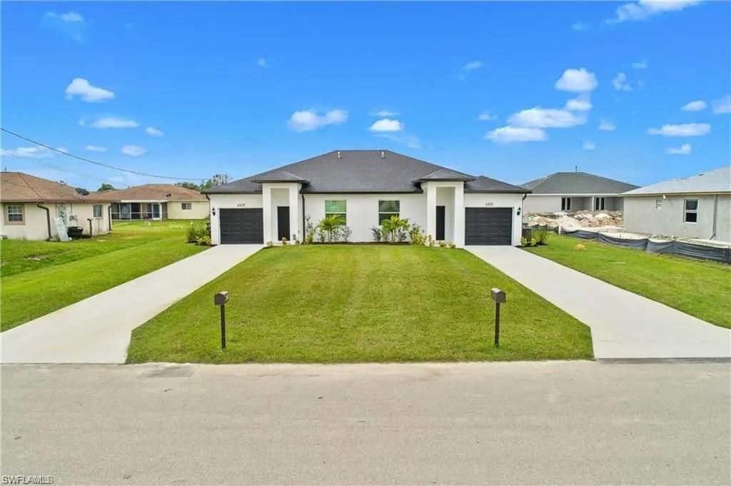 717/719 GORDON AVE S, LEHIGH ACRES, FL 33973 — exterior