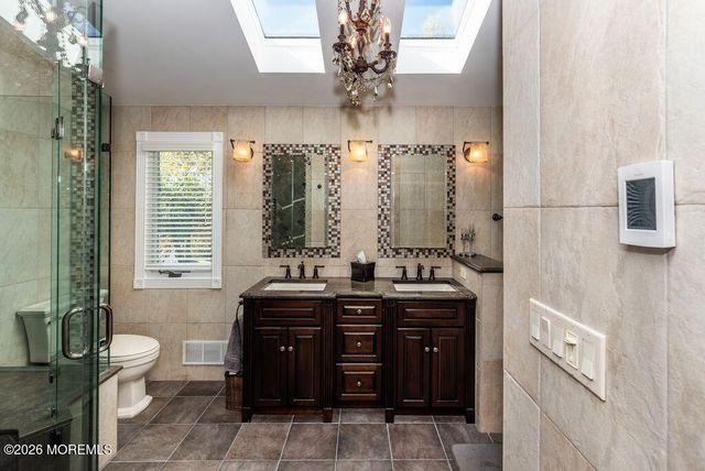 3 Lake Louise Road, Morganville, NJ 07751