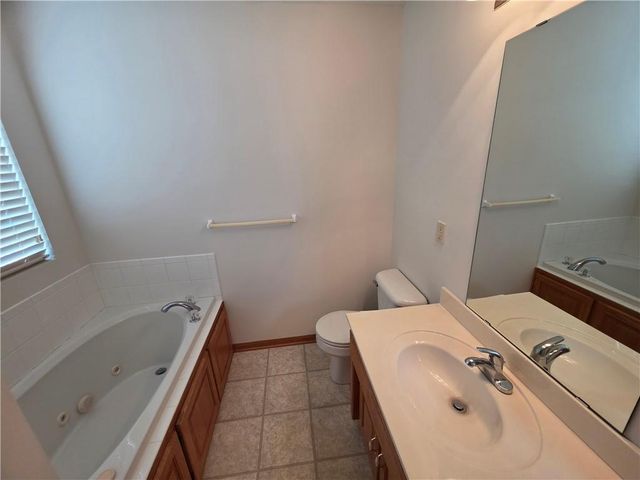 404 Blue Grass Drive, Raymore, MO 64083