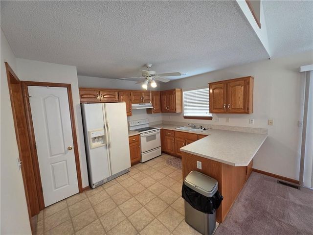 404 Blue Grass Drive, Raymore, MO 64083
