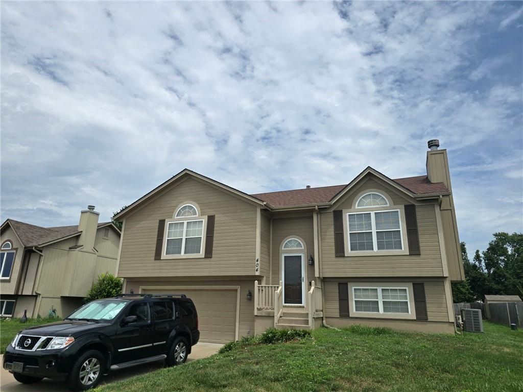 404 Blue Grass Drive, Raymore, MO 64083