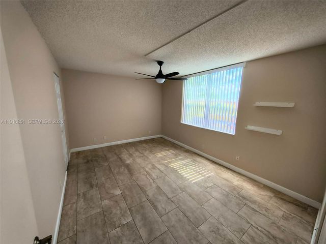 9230 Lagoon Place 310, Davie, FL 33324
