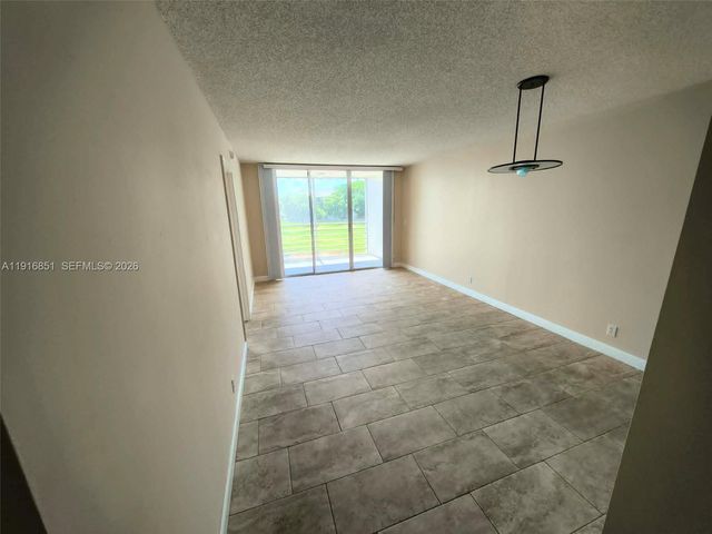 9230 Lagoon Place 310, Davie, FL 33324