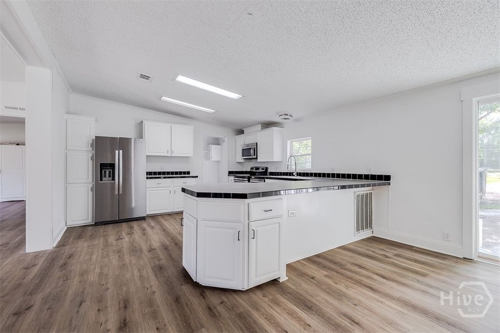 Image 13 of property listing at 318 Samuel Smalls Sr Avenue, Guyton, GA 31312