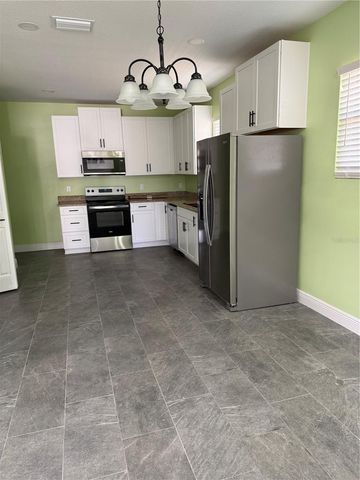 1311 E RIVER COVE STREET, Tampa, FL 33604