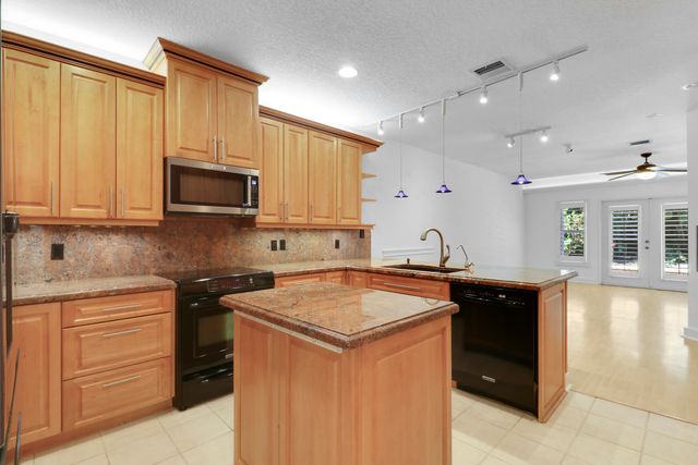12 Grand Bay Circle, Juno Beach, FL 33408
