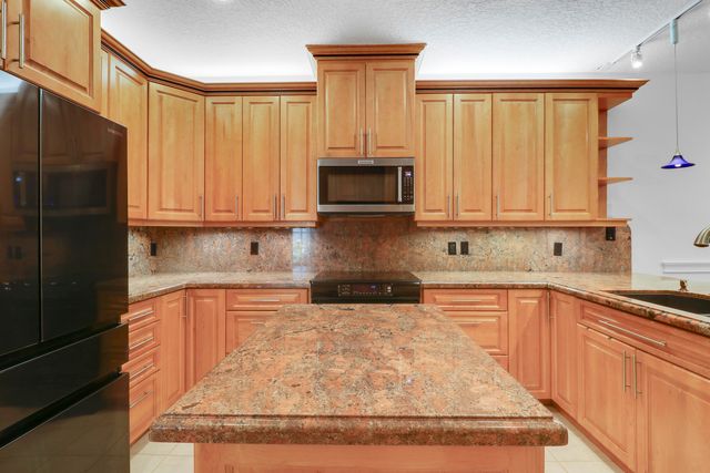 12 Grand Bay Circle, Juno Beach, FL 33408
