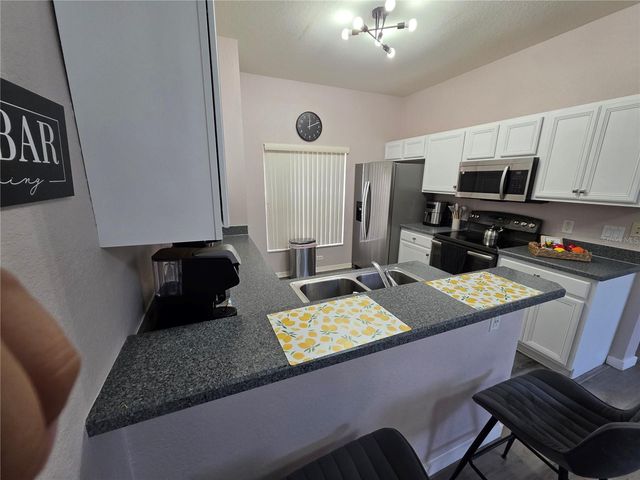 143 E WINDSOR PLACE, Davenport, FL 33896