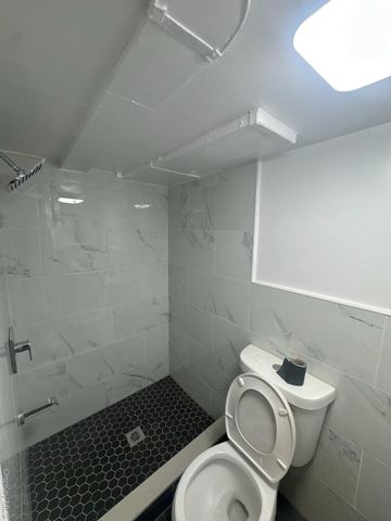 9112 91st Avenue, Woodhaven, NY 11421