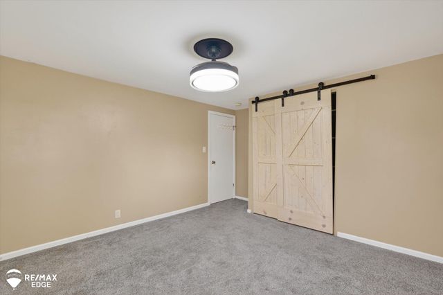 6120 Surrey Lane, Burton, MI 48519