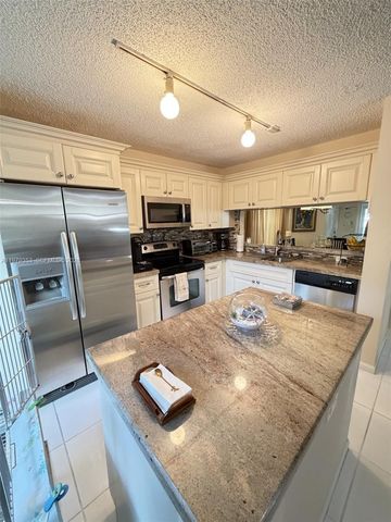 10840 NW 46th Dr, Coral Springs, FL 33076