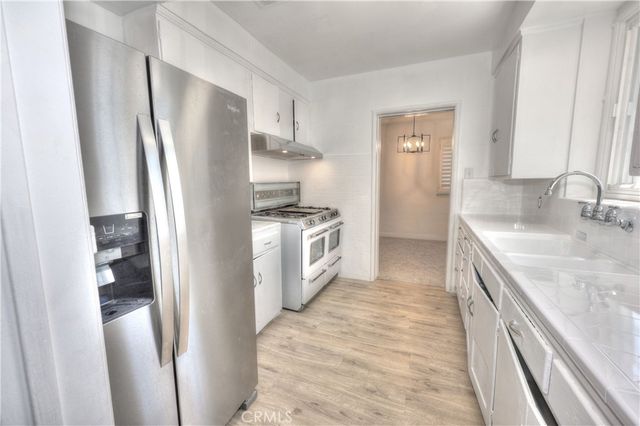 8725 S Gramercy Place, Los Angeles, CA 90047