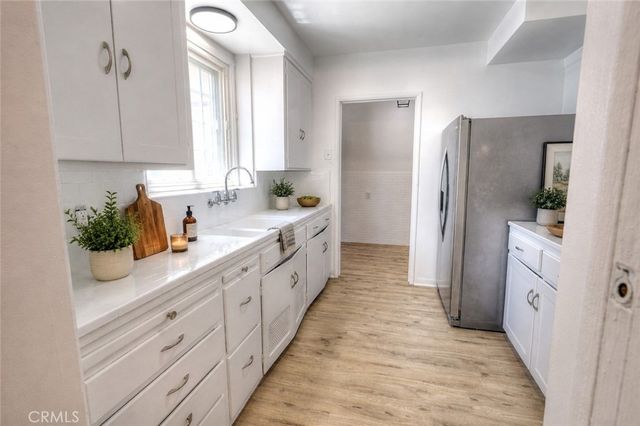 8725 S Gramercy Place, Los Angeles, CA 90047