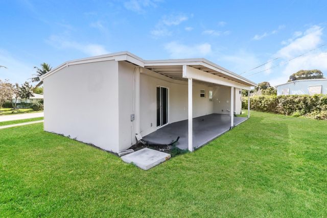 591 Seagrape Road, Lake Worth, FL 33462