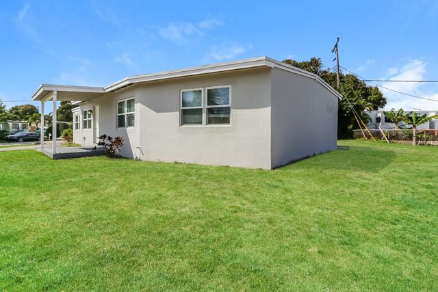 591 Seagrape Road, Lake Worth, FL 33462