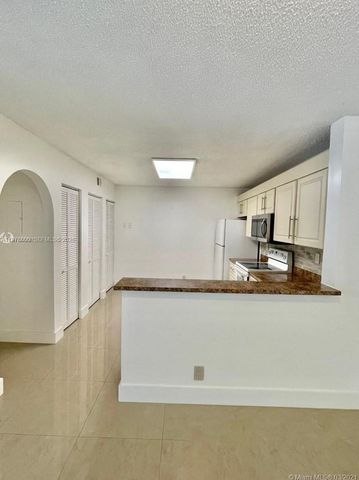 10131 W Sunrise Boulevard 204, Plantation, FL 33322