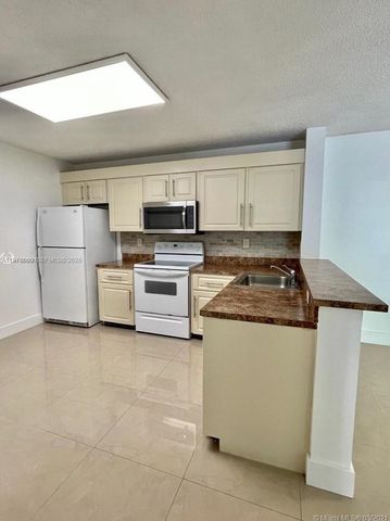 10131 W Sunrise Boulevard 204, Plantation, FL 33322