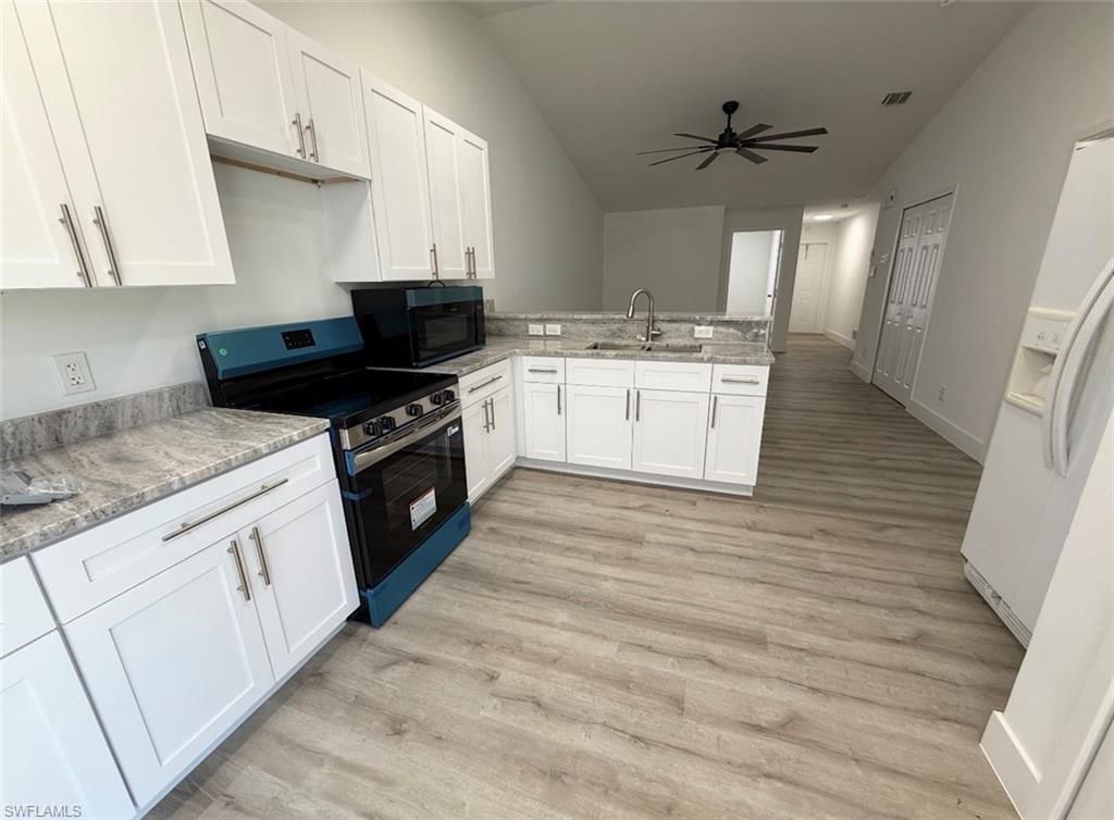 5237-5239 28th ST SW, LEHIGH ACRES, FL 33973 — photo 4