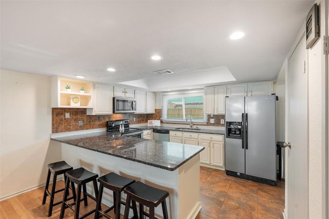 3223 Holly Green Drive, Kingwood, TX 77339
