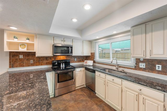 3223 Holly Green Drive, Kingwood, TX 77339