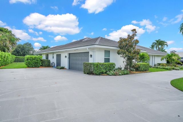 341 Glenbrook Drive, Atlantis, FL 33462