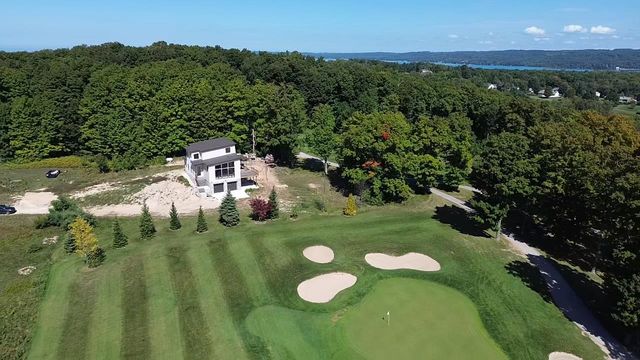 136 Mooney Way, Kewadin, MI 49648