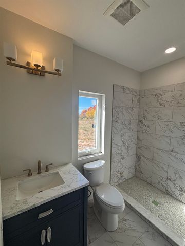 136 Mooney Way, Kewadin, MI 49648