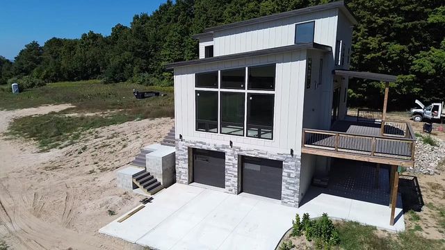 136 Mooney Way, Kewadin, MI 49648