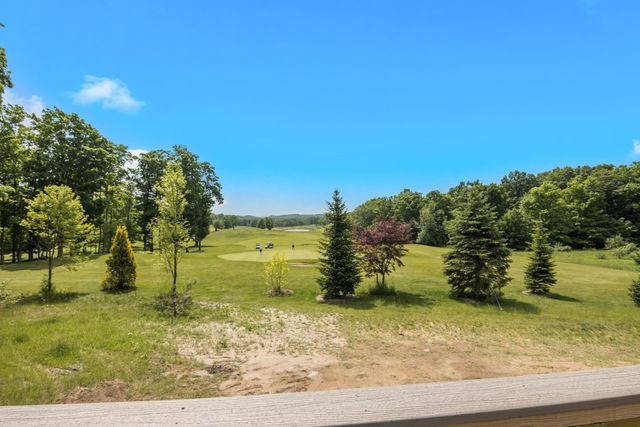 136 Mooney Way, Kewadin, MI 49648