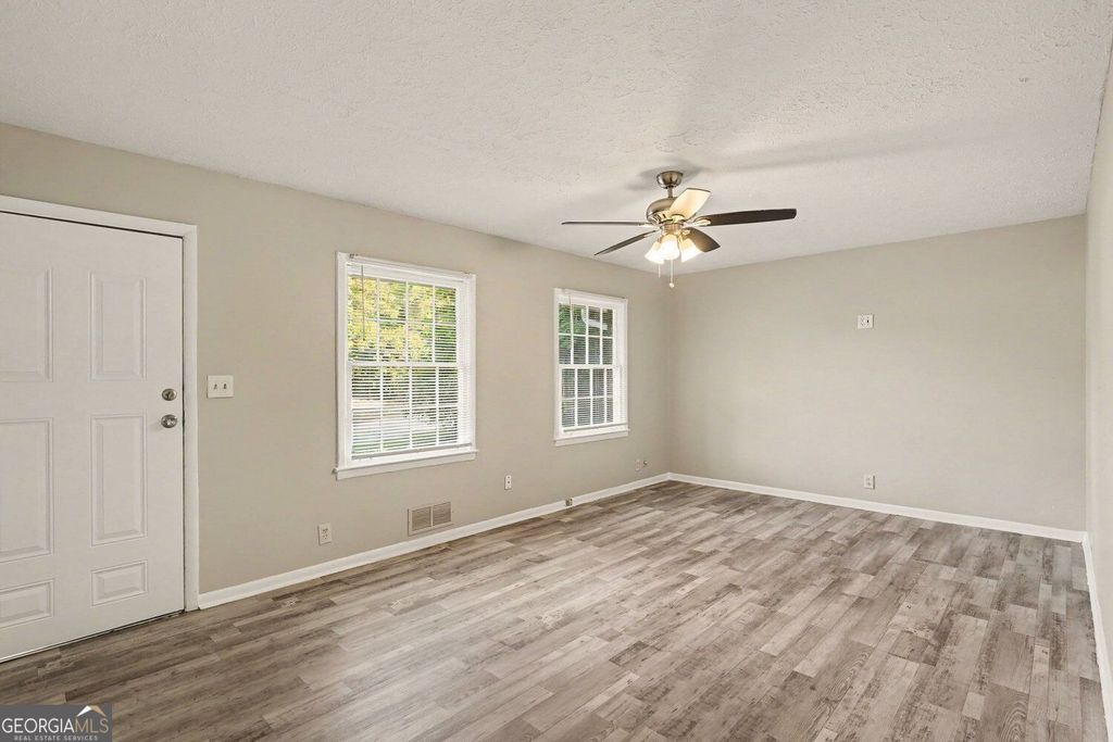 4077 Rockey Valley Drive, Conley, GA 30288 — photo 4